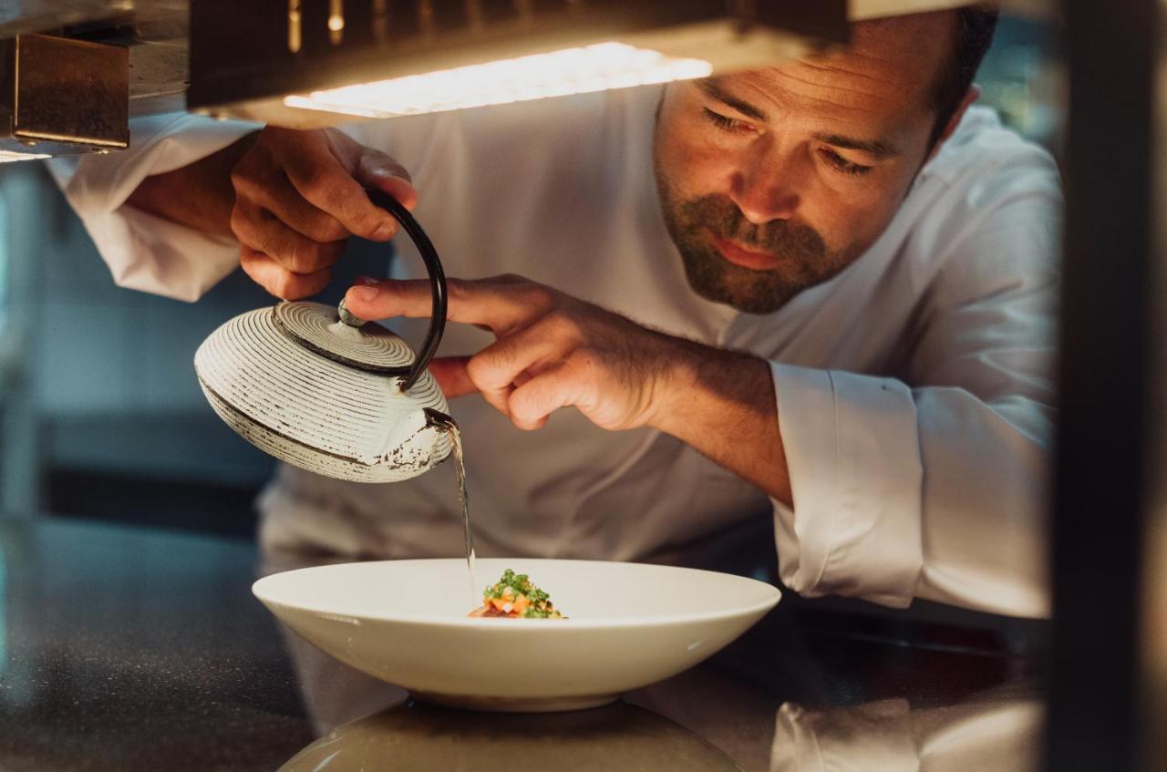 Imlauer Hotel Schloss Pichlarn Aigen im Ennstal Exterior photo Chef preparing a dish