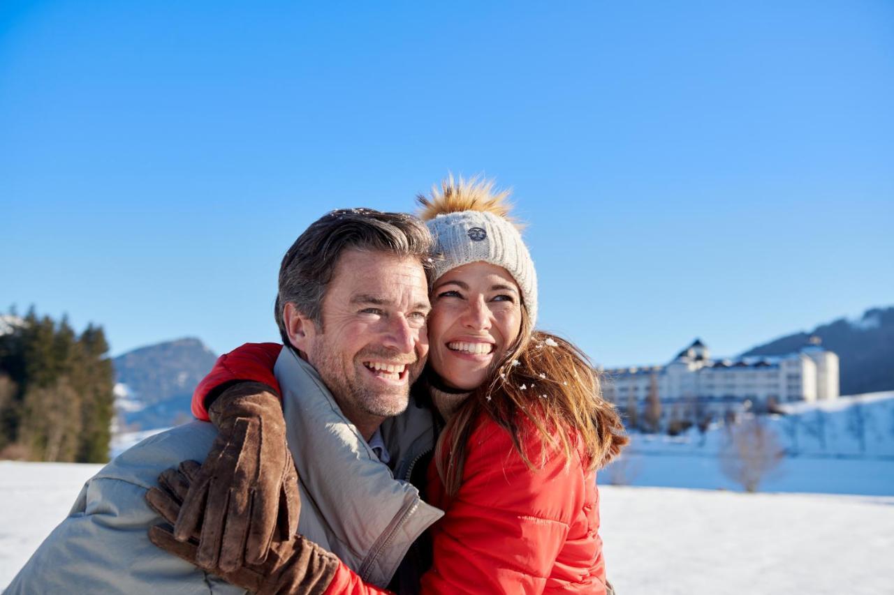 Imlauer Hotel Schloss Pichlarn Aigen im Ennstal Exterior photo A couple in the snow