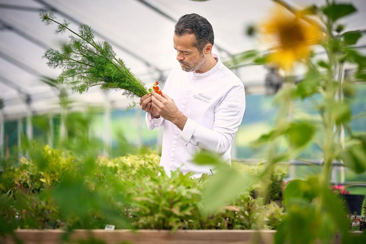 Imlauer Hotel Schloss Pichlarn Aigen im Ennstal Exterior photo A chef working in a greenhouse